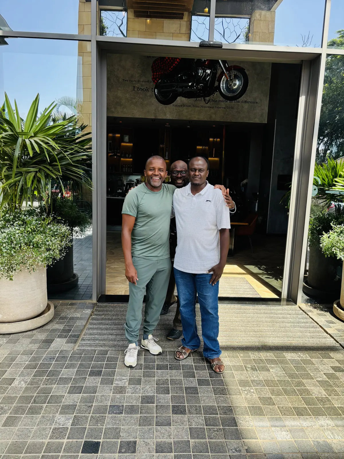 Paul with guests outside a Nairobi establishment